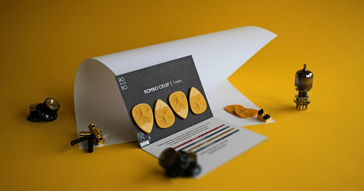 white printer paper on yellow table