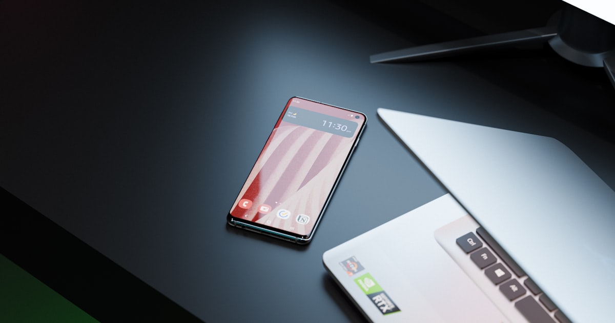 a close up of a cell phone on a table