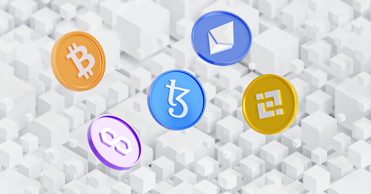 a group of colorful bitcoins sitting on top of a white background