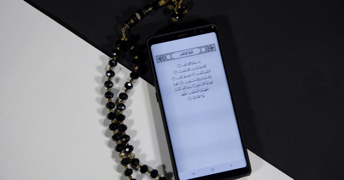 black android smartphone on white table