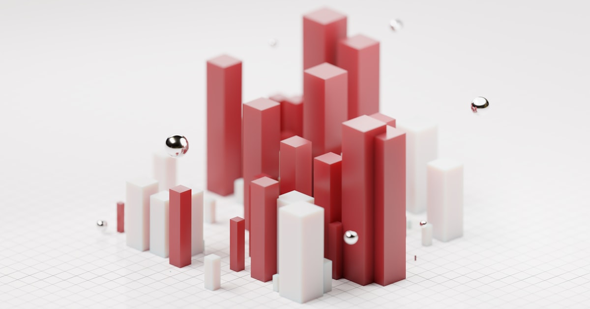 a group of red and white objects on a white surface