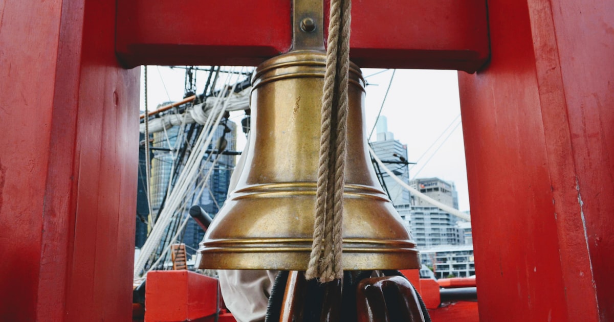 red and brown metal bell