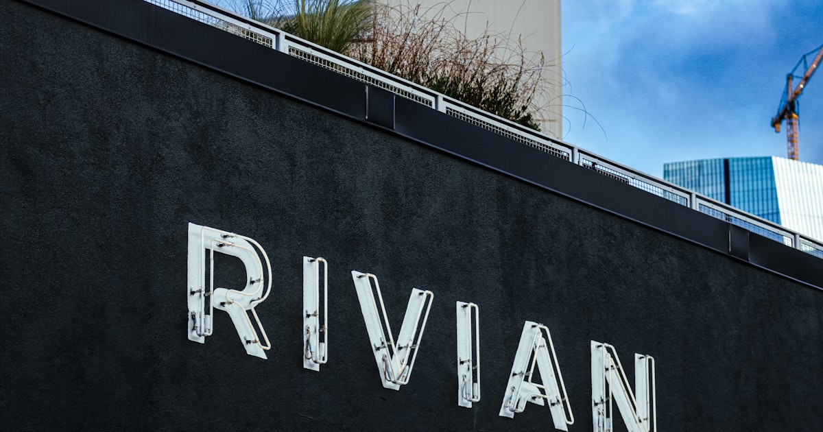The rivian logo is displayed on a building.