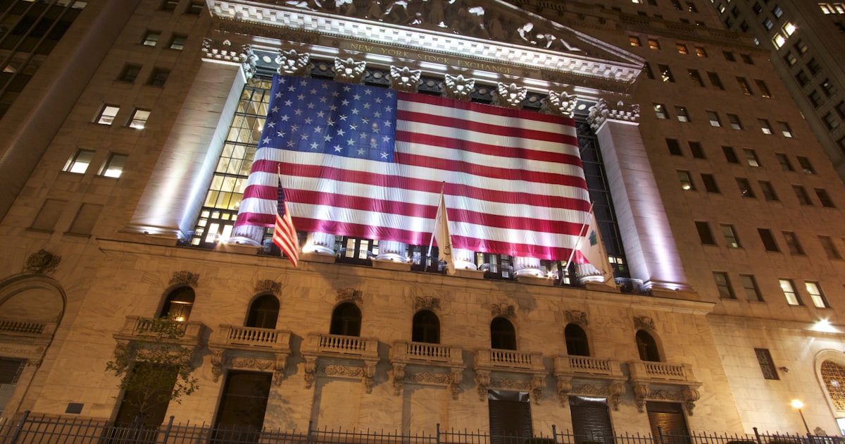 a large flag from the ceiling of a building