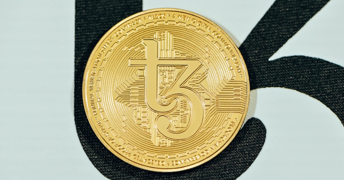 a close up of a coin on a white surface