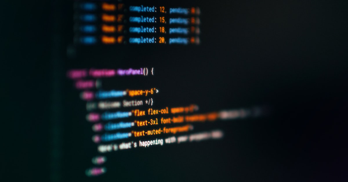 Computer screen displaying colorful code snippets